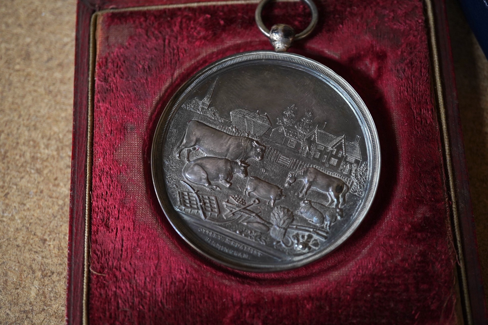 A modern enamelled silver crown coin inset circular pill box, by C.S. Green & Co and an 1863 agricultural prize medallion. Condition - fair.